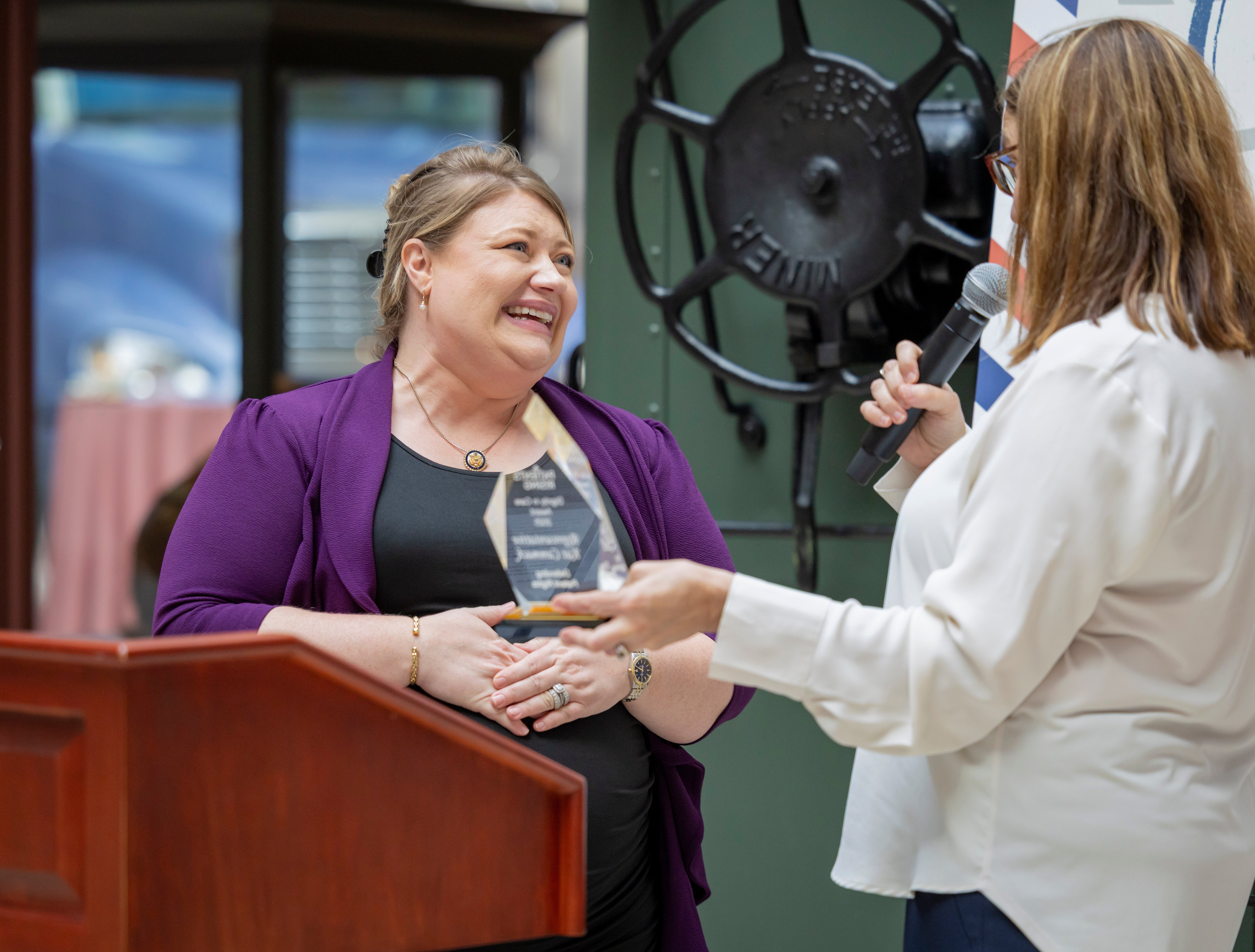 Kat Cammack receiving an award from Terry Wilcox at the 2025 Patients RisingFly-in