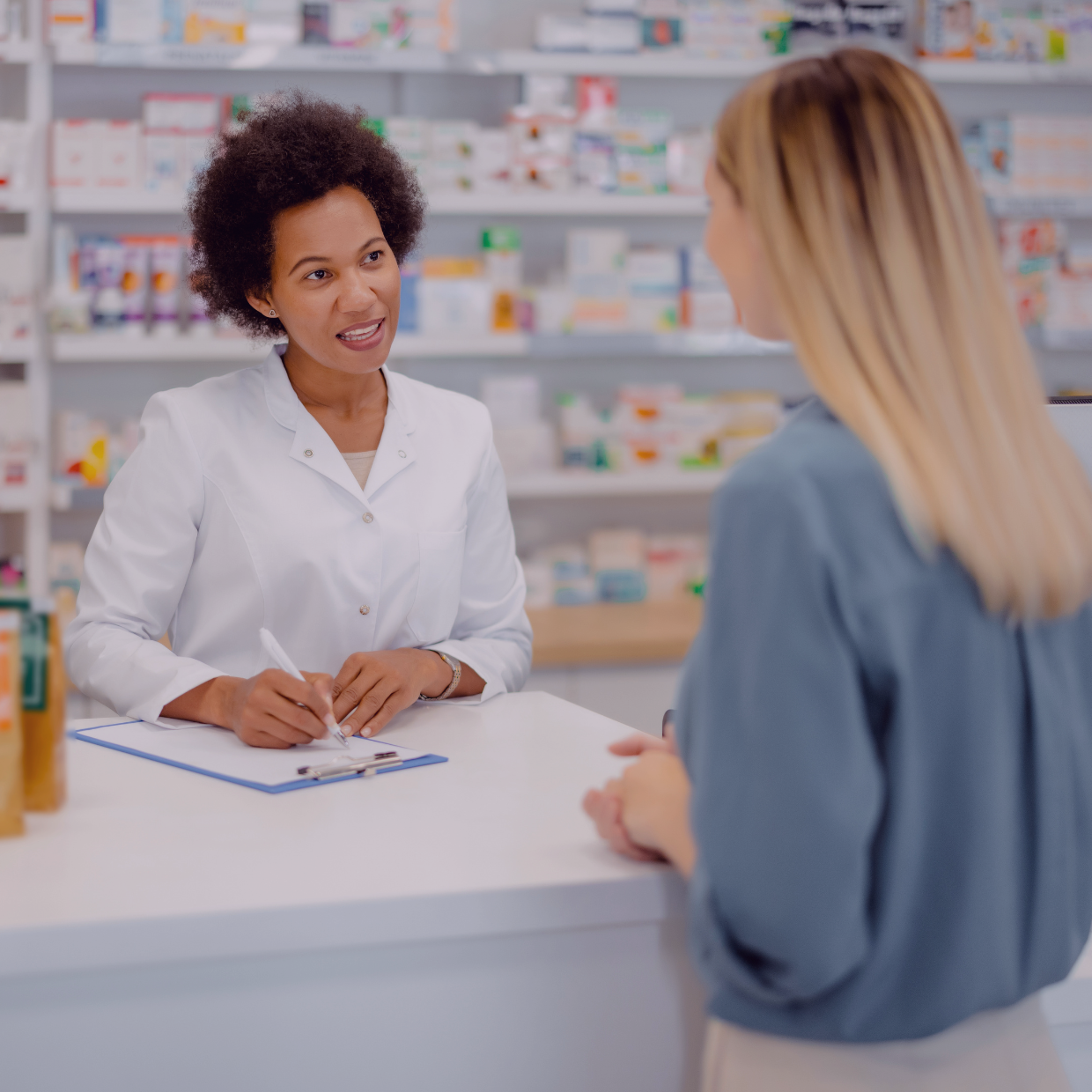 pharmacy counter patient and pharmacist